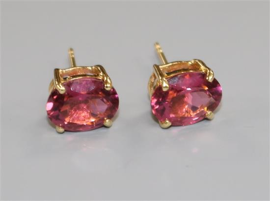 A pair of 18ct yellow gold and pink tourmaline stud earrings,